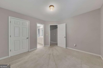 Spacious home nestled in the sought-after Bridgemill community on Bridgemill Golf Club in Georgia - for sale on GolfHomes.com, golf home, golf lot