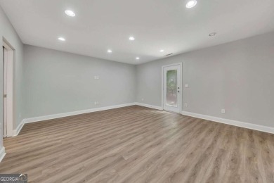 Spacious home nestled in the sought-after Bridgemill community on Bridgemill Golf Club in Georgia - for sale on GolfHomes.com, golf home, golf lot