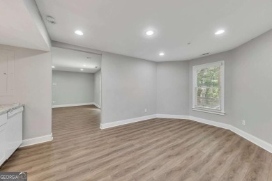 Spacious home nestled in the sought-after Bridgemill community on Bridgemill Golf Club in Georgia - for sale on GolfHomes.com, golf home, golf lot