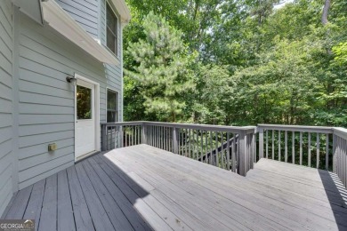 Spacious home nestled in the sought-after Bridgemill community on Bridgemill Golf Club in Georgia - for sale on GolfHomes.com, golf home, golf lot