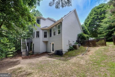 Spacious home nestled in the sought-after Bridgemill community on Bridgemill Golf Club in Georgia - for sale on GolfHomes.com, golf home, golf lot