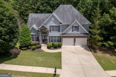 Spacious home nestled in the sought-after Bridgemill community on Bridgemill Golf Club in Georgia - for sale on GolfHomes.com, golf home, golf lot