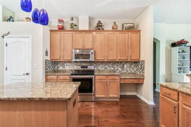 This Stunning 4 Bedroom PLUS Office, 3 Bath, 3 Car Garage home on Pebble Creek Golf Club in Florida - for sale on GolfHomes.com, golf home, golf lot