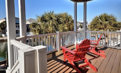 Welcome to your ultimate waterfront paradise! This stunning, 5BR on Sea Trail Golf Resort in North Carolina - for sale on GolfHomes.com, golf home, golf lot