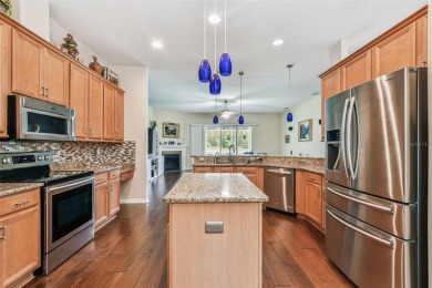 This Stunning 4 Bedroom PLUS Office, 3 Bath, 3 Car Garage home on Pebble Creek Golf Club in Florida - for sale on GolfHomes.com, golf home, golf lot