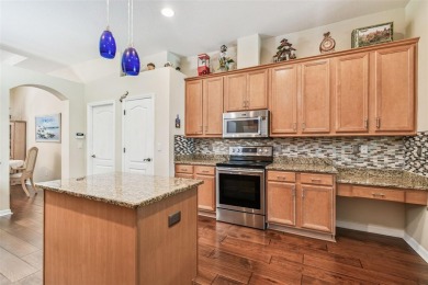This Stunning 4 Bedroom PLUS Office, 3 Bath, 3 Car Garage home on Pebble Creek Golf Club in Florida - for sale on GolfHomes.com, golf home, golf lot