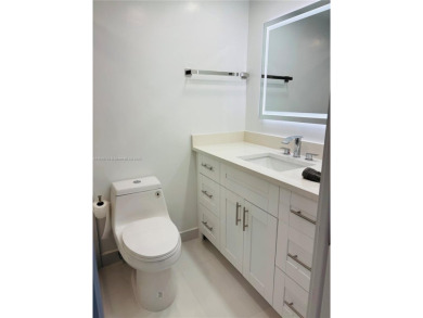 Contemporary designpletely renovated turnkey beautiful 1 bed 1.5 on Hillsboro Pines Golf in Florida - for sale on GolfHomes.com, golf home, golf lot