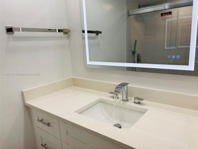 Contemporary designpletely renovated turnkey beautiful 1 bed 1.5 on Hillsboro Pines Golf in Florida - for sale on GolfHomes.com, golf home, golf lot