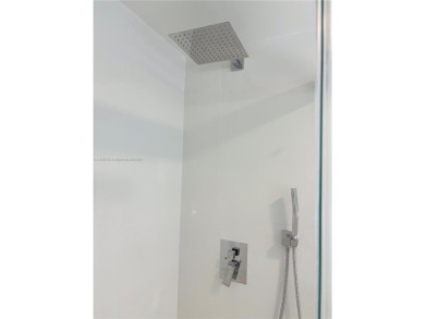 Contemporary designpletely renovated turnkey beautiful 1 bed 1.5 on Hillsboro Pines Golf in Florida - for sale on GolfHomes.com, golf home, golf lot