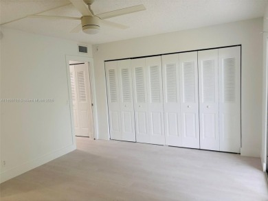 Contemporary designpletely renovated turnkey beautiful 1 bed 1.5 on Hillsboro Pines Golf in Florida - for sale on GolfHomes.com, golf home, golf lot