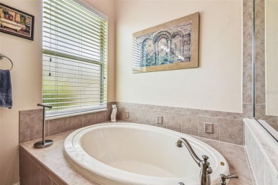 This Stunning 4 Bedroom PLUS Office, 3 Bath, 3 Car Garage home on Pebble Creek Golf Club in Florida - for sale on GolfHomes.com, golf home, golf lot