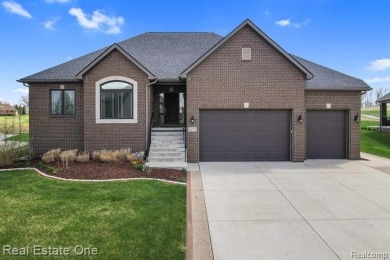 Custom built ranch with finished basement & a covered 288 sf on The Orchards Golf Club in Michigan - for sale on GolfHomes.com, golf home, golf lot