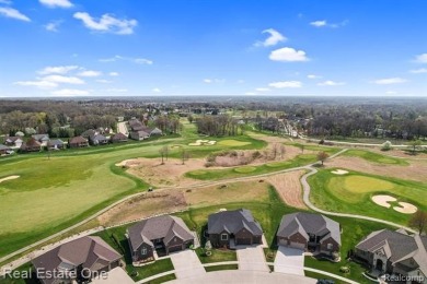 Custom built ranch with finished basement & a covered 288 sf on The Orchards Golf Club in Michigan - for sale on GolfHomes.com, golf home, golf lot