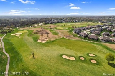 Custom built ranch with finished basement & a covered 288 sf on The Orchards Golf Club in Michigan - for sale on GolfHomes.com, golf home, golf lot