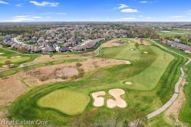 Custom built ranch with finished basement & a covered 288 sf on The Orchards Golf Club in Michigan - for sale on GolfHomes.com, golf home, golf lot