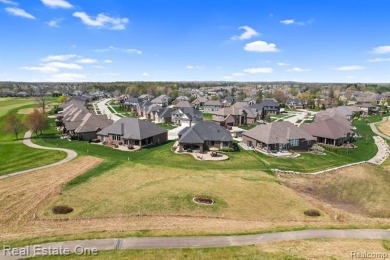 Custom built ranch with finished basement & a covered 288 sf on The Orchards Golf Club in Michigan - for sale on GolfHomes.com, golf home, golf lot
