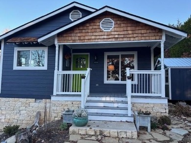 BREATHTAKING VIEWS of the lake and mountains year round!  This on Holiday Island Executive Golf Course in Arkansas - for sale on GolfHomes.com, golf home, golf lot