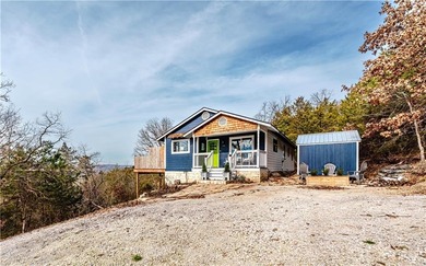 BREATHTAKING VIEWS of the lake and mountains year round!  This on Holiday Island Executive Golf Course in Arkansas - for sale on GolfHomes.com, golf home, golf lot