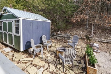 BREATHTAKING VIEWS of the lake and mountains year round!  This on Holiday Island Executive Golf Course in Arkansas - for sale on GolfHomes.com, golf home, golf lot