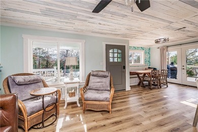 BREATHTAKING VIEWS of the lake and mountains year round!  This on Holiday Island Executive Golf Course in Arkansas - for sale on GolfHomes.com, golf home, golf lot