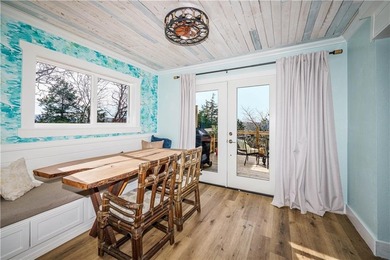 BREATHTAKING VIEWS of the lake and mountains year round!  This on Holiday Island Executive Golf Course in Arkansas - for sale on GolfHomes.com, golf home, golf lot