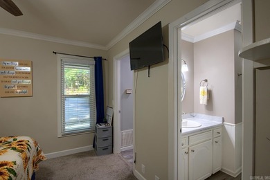 Impeccably updated and in a great location within walking on DeSoto Golf Course in Arkansas - for sale on GolfHomes.com, golf home, golf lot