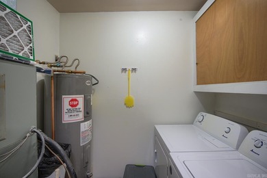 Impeccably updated and in a great location within walking on DeSoto Golf Course in Arkansas - for sale on GolfHomes.com, golf home, golf lot