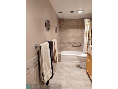TURN KEY 900 SQ FT 1 BEDROOM IN PRESTIGIOUS ARUBA. EVERYTHING on Wynmoor Golf Course in Florida - for sale on GolfHomes.com, golf home, golf lot