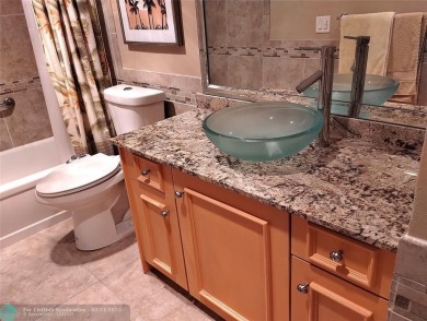 TURN KEY 900 SQ FT 1 BEDROOM IN PRESTIGIOUS ARUBA. EVERYTHING on Wynmoor Golf Course in Florida - for sale on GolfHomes.com, golf home, golf lot