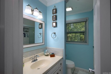 Impeccably updated and in a great location within walking on DeSoto Golf Course in Arkansas - for sale on GolfHomes.com, golf home, golf lot