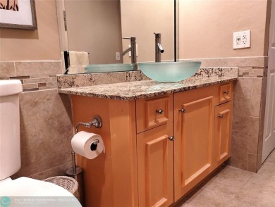 TURN KEY 900 SQ FT 1 BEDROOM IN PRESTIGIOUS ARUBA. EVERYTHING on Wynmoor Golf Course in Florida - for sale on GolfHomes.com, golf home, golf lot