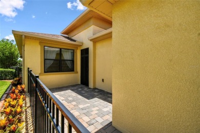 Enjoy gorgeous and relaxing WATER VIEWS from this beautifully on Stonegate Golf Club in Florida - for sale on GolfHomes.com, golf home, golf lot