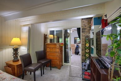 Impeccably updated and in a great location within walking on DeSoto Golf Course in Arkansas - for sale on GolfHomes.com, golf home, golf lot