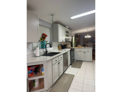 It's hard to know where to start with this home because it has on The Meadows At Countrywood in Florida - for sale on GolfHomes.com, golf home, golf lot