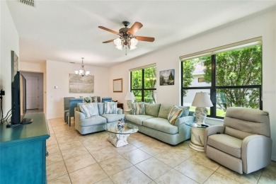 Enjoy gorgeous and relaxing WATER VIEWS from this beautifully on Stonegate Golf Club in Florida - for sale on GolfHomes.com, golf home, golf lot