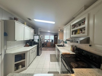 It's hard to know where to start with this home because it has on The Meadows At Countrywood in Florida - for sale on GolfHomes.com, golf home, golf lot