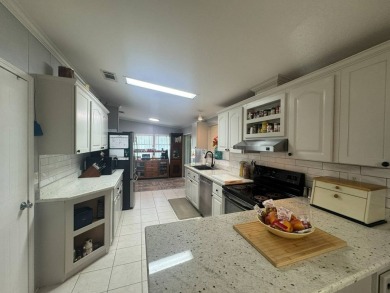 It's hard to know where to start with this home because it has on The Meadows At Countrywood in Florida - for sale on GolfHomes.com, golf home, golf lot