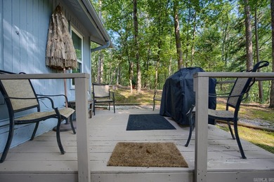 Impeccably updated and in a great location within walking on DeSoto Golf Course in Arkansas - for sale on GolfHomes.com, golf home, golf lot