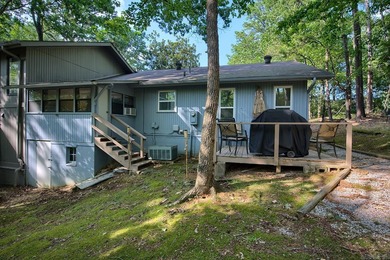 Impeccably updated and in a great location within walking on DeSoto Golf Course in Arkansas - for sale on GolfHomes.com, golf home, golf lot