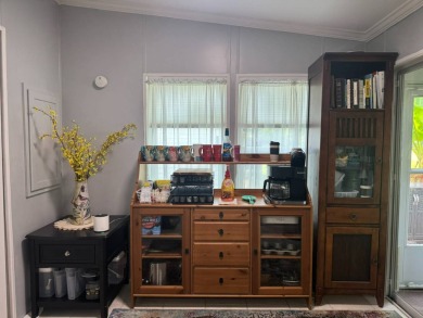 It's hard to know where to start with this home because it has on The Meadows At Countrywood in Florida - for sale on GolfHomes.com, golf home, golf lot