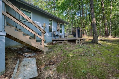 Impeccably updated and in a great location within walking on DeSoto Golf Course in Arkansas - for sale on GolfHomes.com, golf home, golf lot