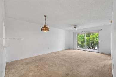 Resort-Style Living in Century Village! Enjoy stunning lake on Flamingo Lakes Country Club in Florida - for sale on GolfHomes.com, golf home, golf lot