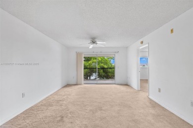 Resort-Style Living in Century Village! Enjoy stunning lake on Flamingo Lakes Country Club in Florida - for sale on GolfHomes.com, golf home, golf lot