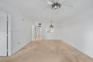 Resort-Style Living in Century Village! Enjoy stunning lake on Flamingo Lakes Country Club in Florida - for sale on GolfHomes.com, golf home, golf lot