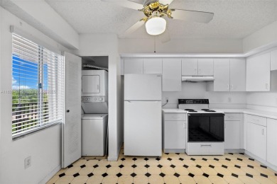 Resort-Style Living in Century Village! Enjoy stunning lake on Flamingo Lakes Country Club in Florida - for sale on GolfHomes.com, golf home, golf lot