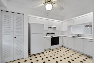 Resort-Style Living in Century Village! Enjoy stunning lake on Flamingo Lakes Country Club in Florida - for sale on GolfHomes.com, golf home, golf lot