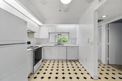 Resort-Style Living in Century Village! Enjoy stunning lake on Flamingo Lakes Country Club in Florida - for sale on GolfHomes.com, golf home, golf lot