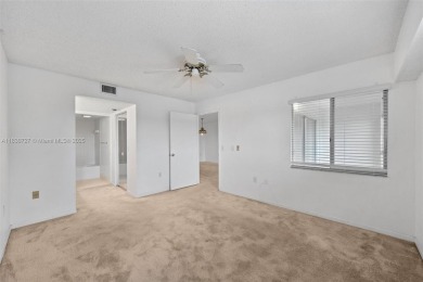 Resort-Style Living in Century Village! Enjoy stunning lake on Flamingo Lakes Country Club in Florida - for sale on GolfHomes.com, golf home, golf lot