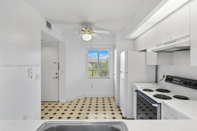Resort-Style Living in Century Village! Enjoy stunning lake on Flamingo Lakes Country Club in Florida - for sale on GolfHomes.com, golf home, golf lot