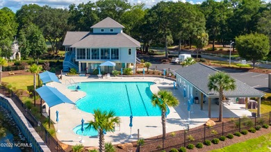 Large, wooded lot on Oyster Bay #11 Hole in Sea Trail Plantation on Sea Trail Golf Resort in North Carolina - for sale on GolfHomes.com, golf home, golf lot